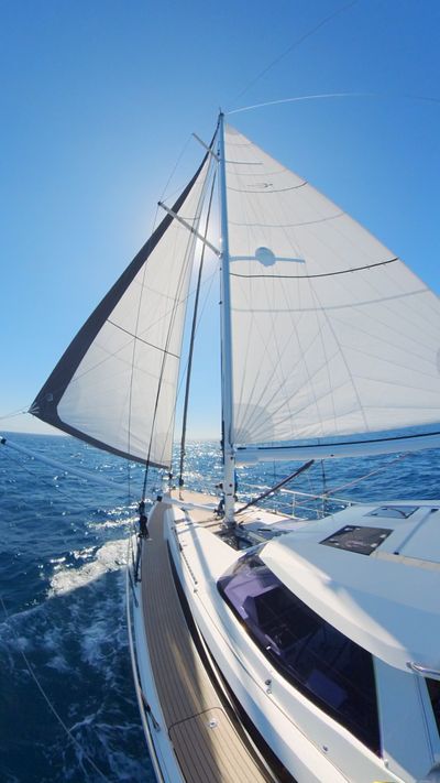 Sailing downwind wing-on-wing with the whisker pole out.